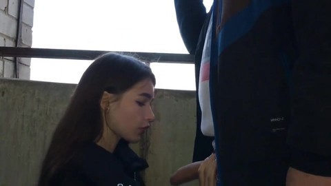 Young girl sucks and takes cum in her mouth on the balco