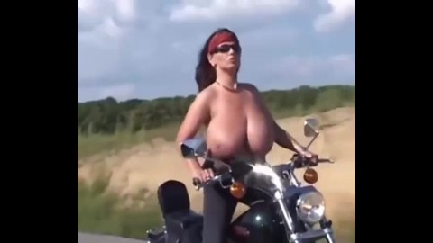 Big tits riding a moto