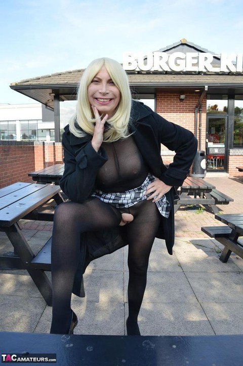 Older blonde Barby Slut flashes her pussy in public wearing crotchless hose | Фото 13