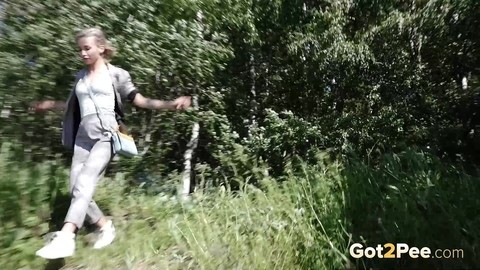 Blonde girl Masha squats for a piss between a couple of boulders | Фото 1