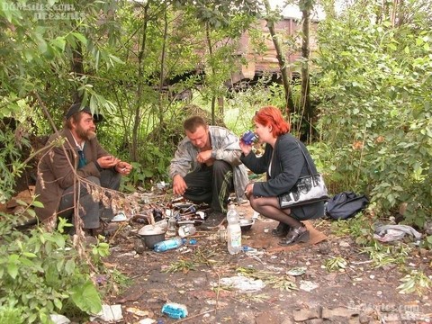 Horny older woman with red hair fucks 3 homeless men at their camp in woods | Фото 2