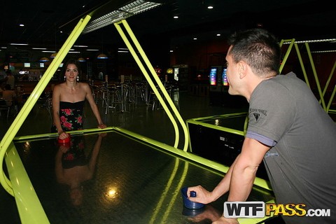 Brunette amateur Leila exposes her tiny tits before a game of air hockey | Фото 14