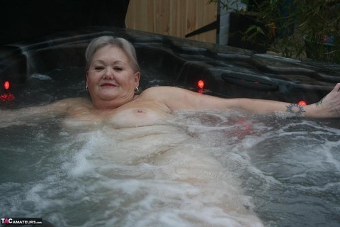 Fat oma changes into nylons and heels after lounging naked in hot tub | Фото 19