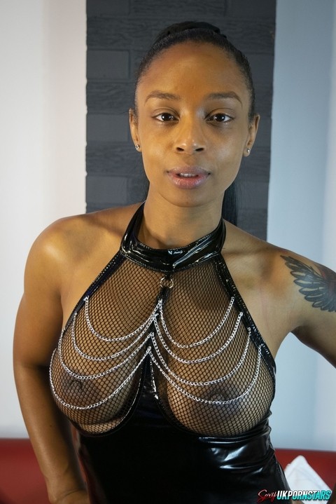 Ebony model Alicia Rhodes poses in a see-through top and over the knee boots | Фото 2