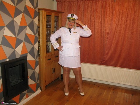 Thick blonde Chrissy Uk exposes her tits while wearing her uniform | Фото 2