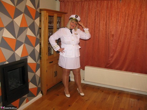 Thick blonde Chrissy Uk exposes her tits while wearing her uniform | Фото 3