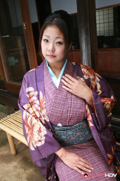 Japanese female lifts up her kimono for a no panty upskirt on the patio | Фото 2