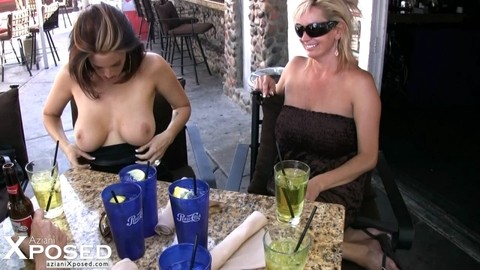 Pornstars Nikki Novam & Rachel Aziani expose tits and twats at an outdoor cafe | Фото 13