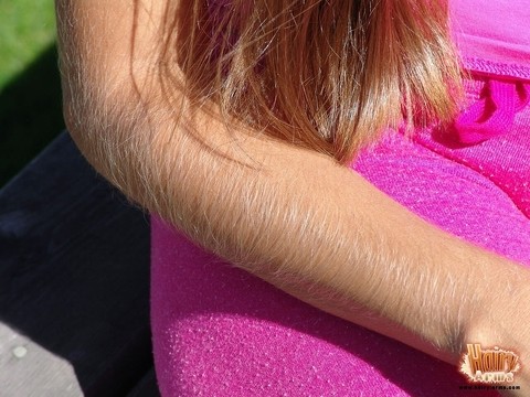 MILF in a pink outfit Lori Anderson showing off her very hairy arms & legs