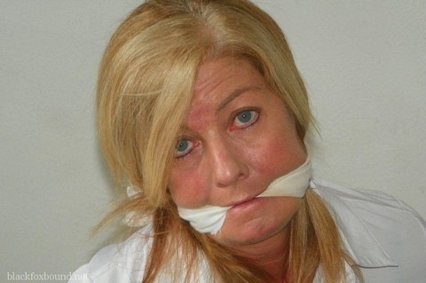 Blonde woman is cleave gagged and hogtied in a white blouse and blue jeans | Фото 7