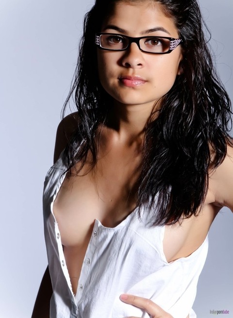 Indian solo girl strips to her sexy panties wearing glasses