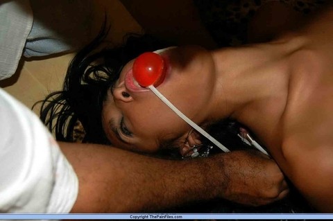 Petite Asian girl is flogged after being roped tied and ball gagged | Фото 11