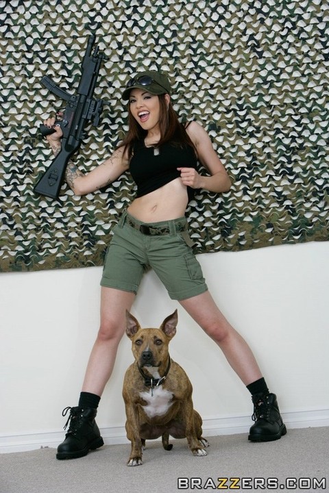 Sexy military MILF Adrenalynn shows her fakes & poses with an assault rifle | Фото 5