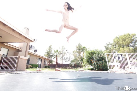 Leggy solo girl Lola Hunter poses outdoors beside swimming pool in bikini | Фото 10