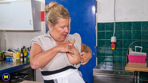 Old cleaning woman strips to sheer stockings while masturbating in the kitchen | Фото 4