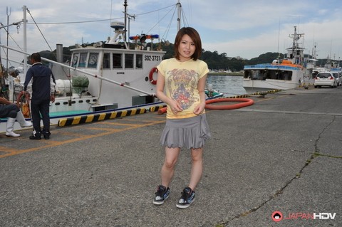 Young Japanese girl Miki Uemura poses on non nude in a skirt on a dock | Фото 6