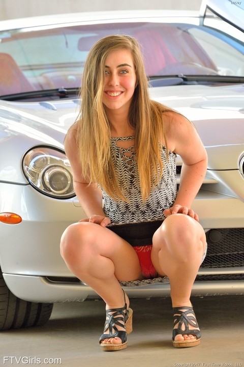 Babe with sexy blue eyes Lacey toying her horny pussy on her classy car | Фото 2