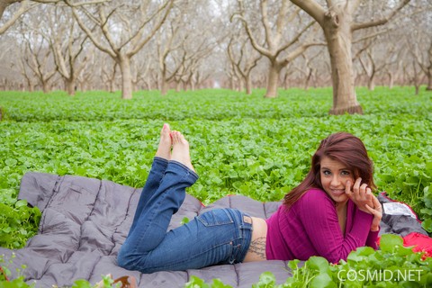 Aubrey Chase takes her purple sweater off and shows her big boobs in the park