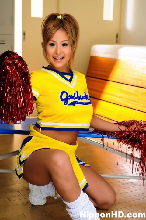 Adorable Japanese cheerleader uncovers great tits before showing her pussy | Фото 6