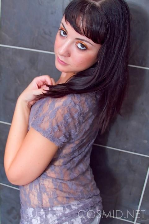 Brunette solo girl Chibi Emi makes her nude debut in the shower