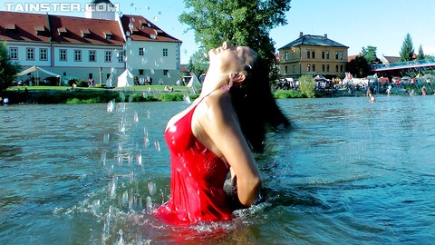 Seductive fetish babe Gina Killmer getting her clothes wet in public place | Фото 12