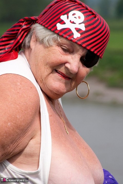 Fat British granny exposes herself on a bridge while sporting pirate attire | Фото 9