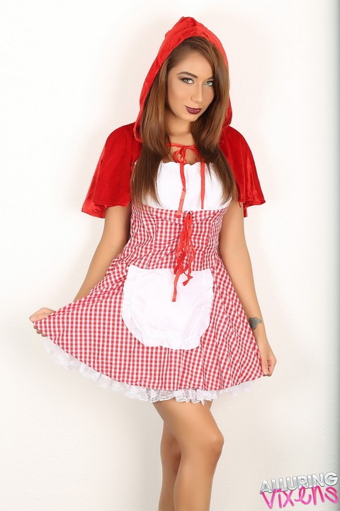 Cute girl Lilly flashes a no panty upskirt in Little Red Riding Hood outfit | Фото 4