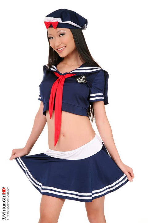 Adorable Asian model Pussykat looses her assets from a cute sailor outfit | Фото 1