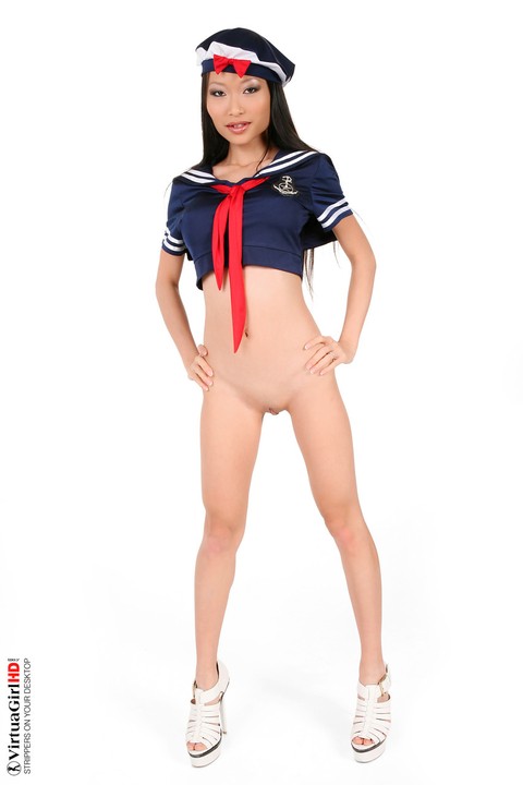 Adorable Asian model Pussykat looses her assets from a cute sailor outfit | Фото 13