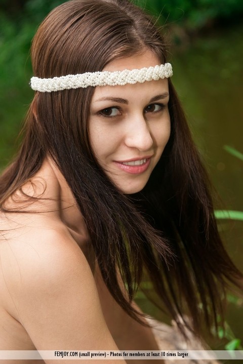 Sweet brunette Edessa G gets naked on windfall while wearing a headband | Фото 4