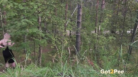 Blonde girl hikes up a black dress to piss in the woods while wearing Docs | Фото 14