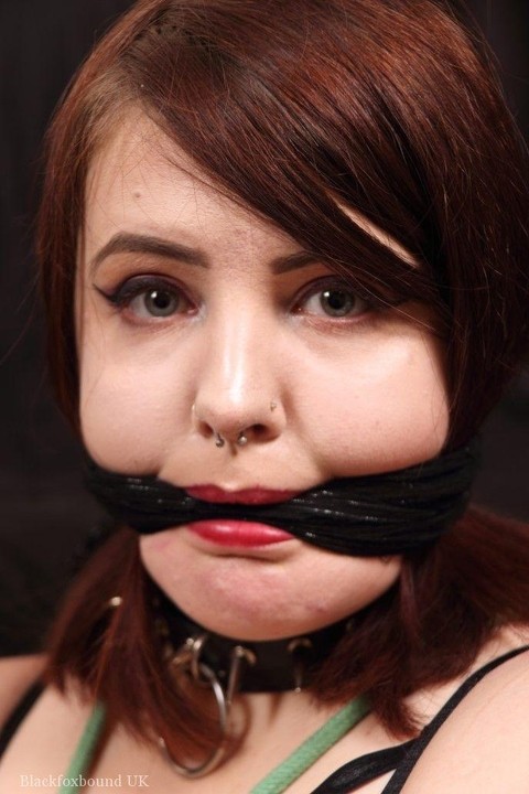 Overweight girl is tied up and cleave gagged in her pretties and slave collar