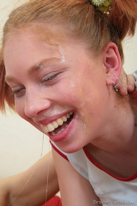 Young redhead wears her hair in pigtails during extreme oral fucking | Фото 5