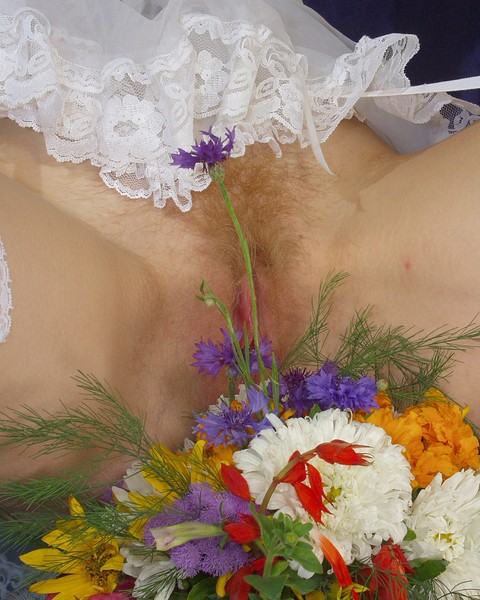 White girl removes maid attire before peeing on a bunch of flowers | Фото 11