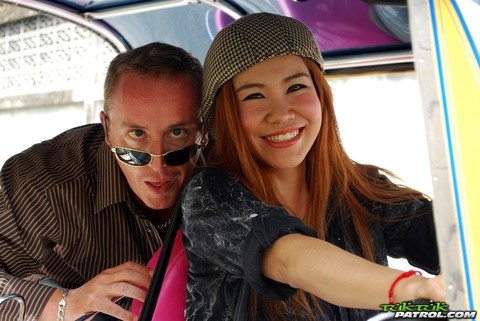 Asian cute babe Noy takes a ride with a stranger on his mini taxi | Фото 11