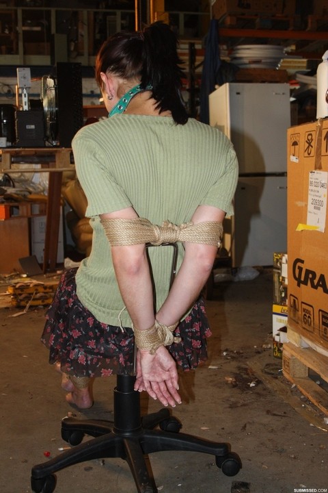 Clothed female is left alone in a chair after being ball gagged and tied up | Фото 14