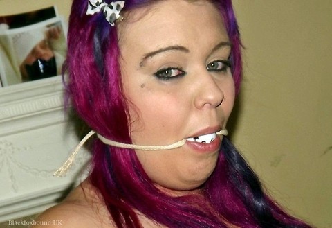 Busty girl with pink hair finds herself gagged and restrained to a chair | Фото 16