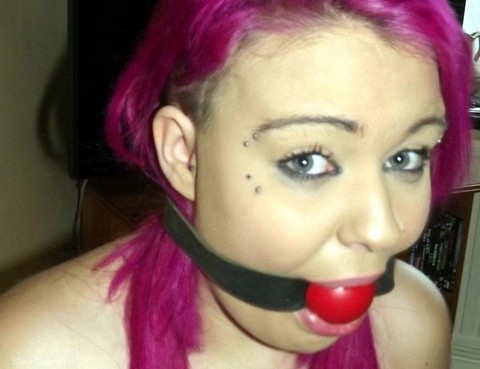 Busty girl with pink hair finds herself gagged and restrained to a chair | Фото 7