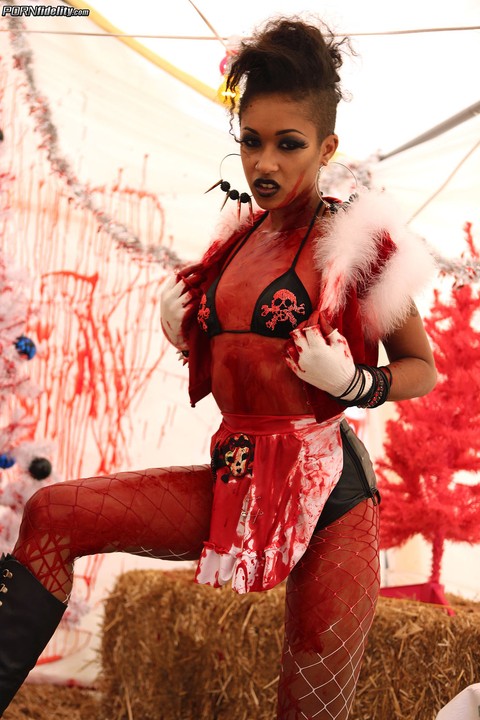 Perfect ebony babe Skin Diamond poses in hot costume in nasty solo action | Фото 14