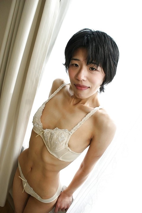 Skinny Asian milf Shinobu Funayama is undressing her lingerie