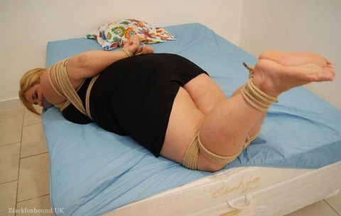 Strawberry blonde plumper is tied up with rope while cleave gagged