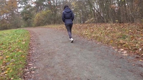 Brunette chick Helen takes a piss on a gravel path during a walk in the woods | Фото 15