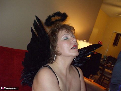 Mature amateur Busty Bliss sports a halo and angel wings while giving head | Фото 15