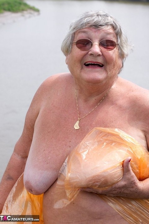 Obese British amateur Grandma Libby casts off a see-through raincoat