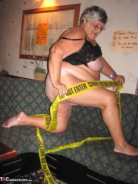 Obese granny Grandma Libby wraps her mostly naked body in crime scene tape | Фото 4