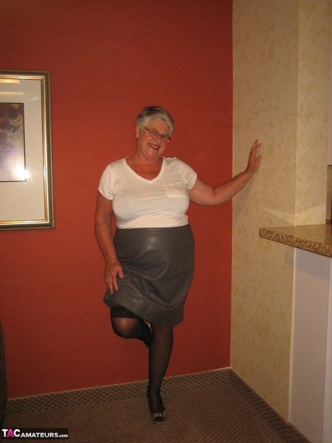 Old woman Girdle Goddess frees her fat body from clothes in stockings