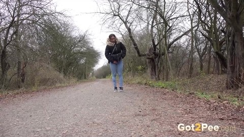 Solo girl Natasha Ink squats to pee on a country road while wearing a parka | Фото 14