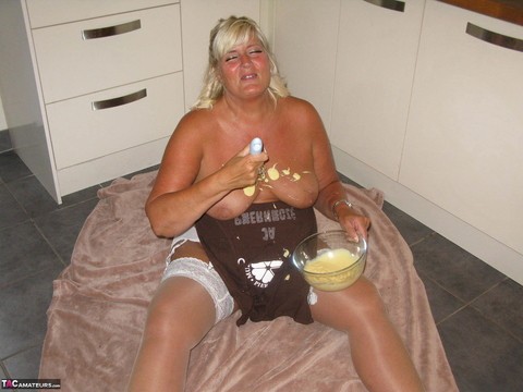 Middle-age blonde plumper Chrissy Uk covers her mostly naked body in batter | Фото 12