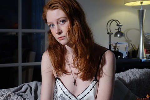 Natural redhead Nathalie Lawson exposes a breast while wearing lingerie | Фото 14