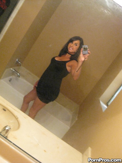 Dark haired ex-gf Sarah Copafeel does a slow striptease in the bathroom